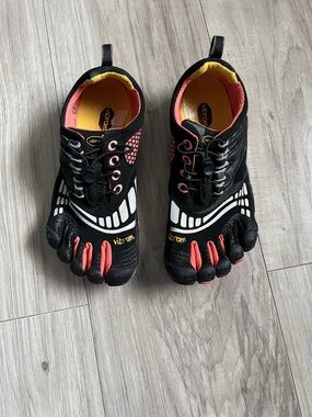 Vibram FiveFingers Black Athletic Toe Shoes with Coral and Yellow Accents